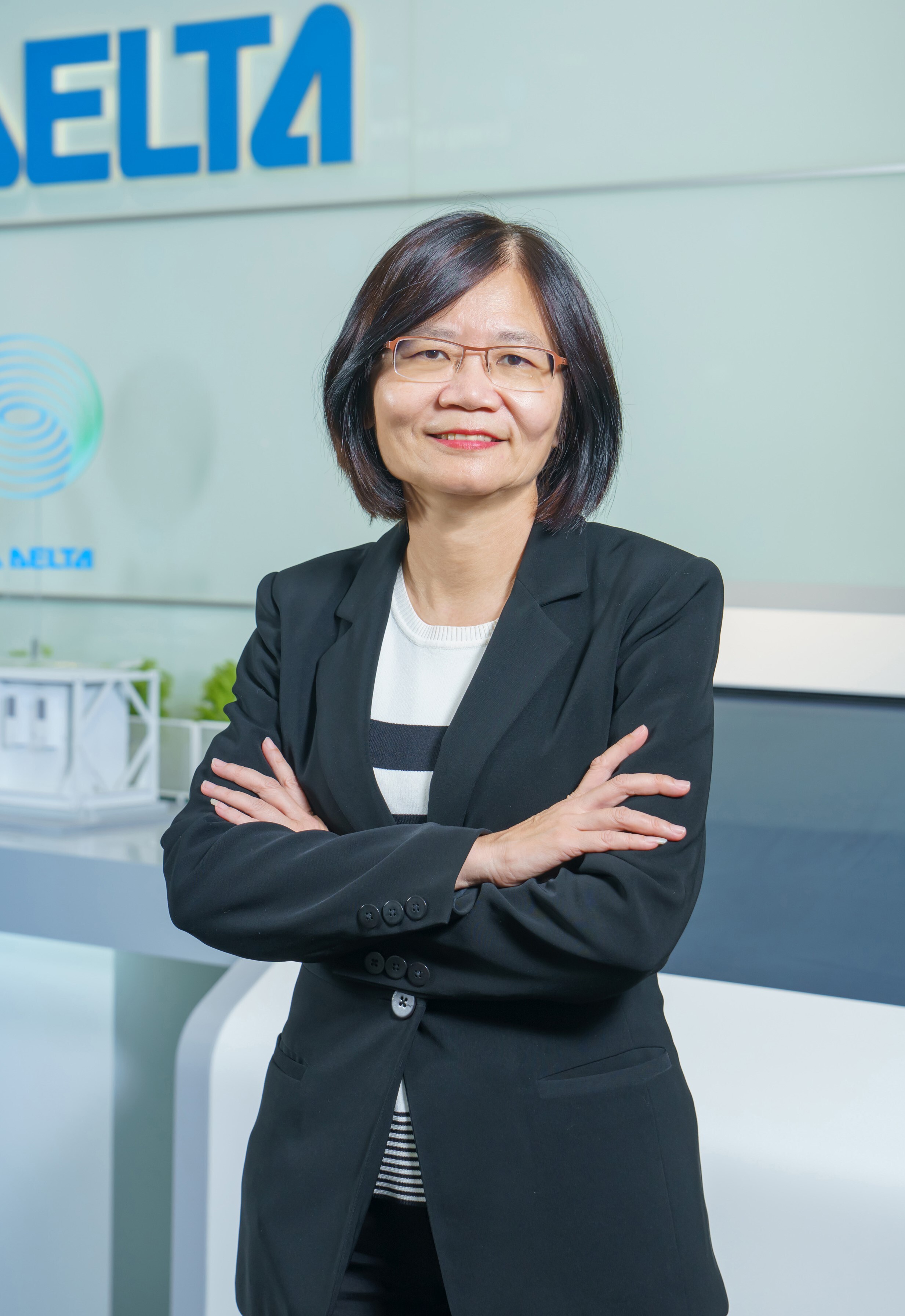 Portrait photo of a faculty member of the Institute of International Business at National Cheng Kung University